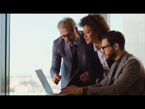 Team collaborating on cybersecurity in a modern office